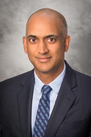 Headshot of Arjun Murti 